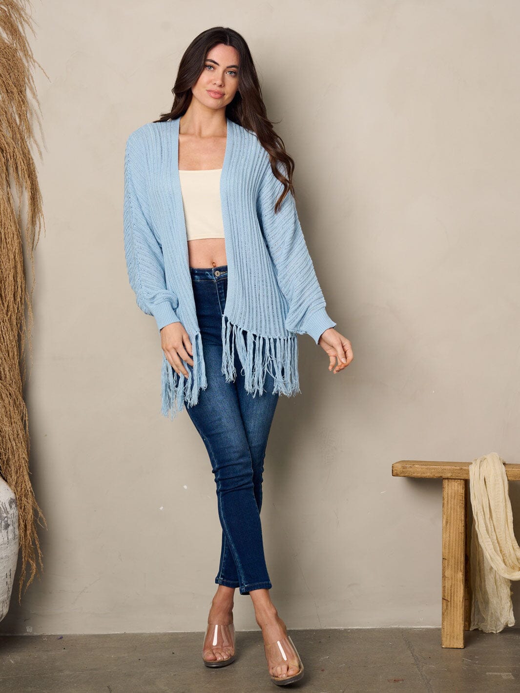 Woman long sleeve open front fringe