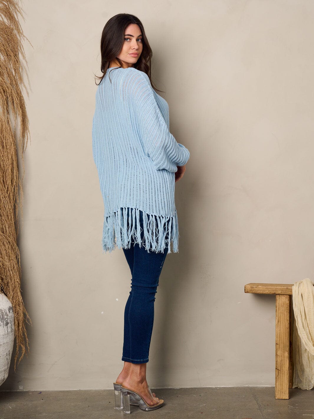 Woman long sleeve open front fringe